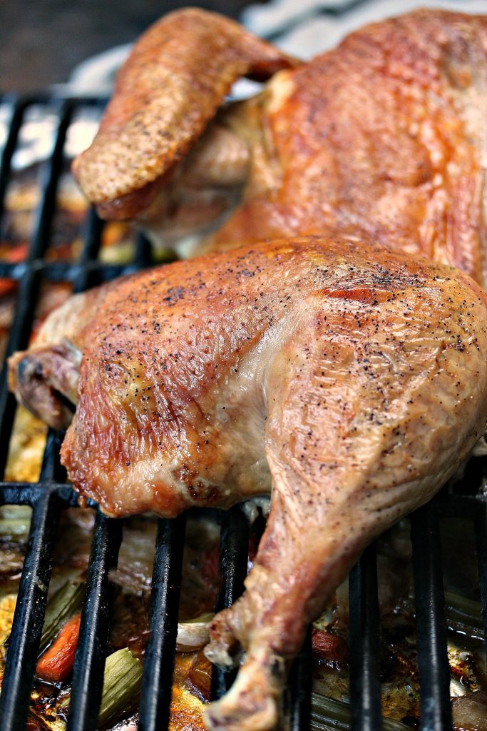 How to Cook a Spatchcocked Turkey by cravingsofalunatic.com- This method is the quickest way to cook a whole turkey. It ensures even cooking of the meat, and produces super crisp skin. This recipe is a winner!