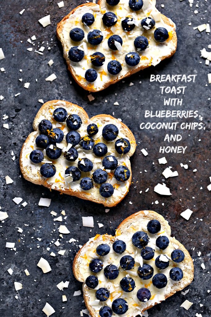 Breakfast Toast with Blueberries, Coconut Chips, and Honey. For more great recipes visit cravingsofalunatic.com 