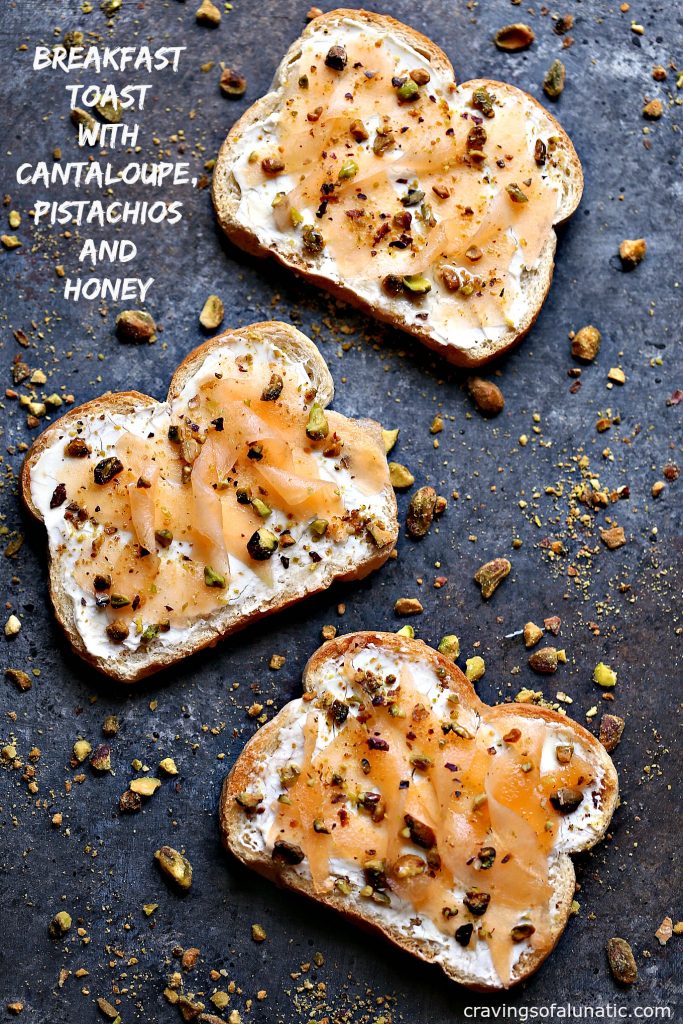Breakfast Toast with Cantaloupe, Pistachios, and Honey. For more great recipes visit cravingsofalunatic.com