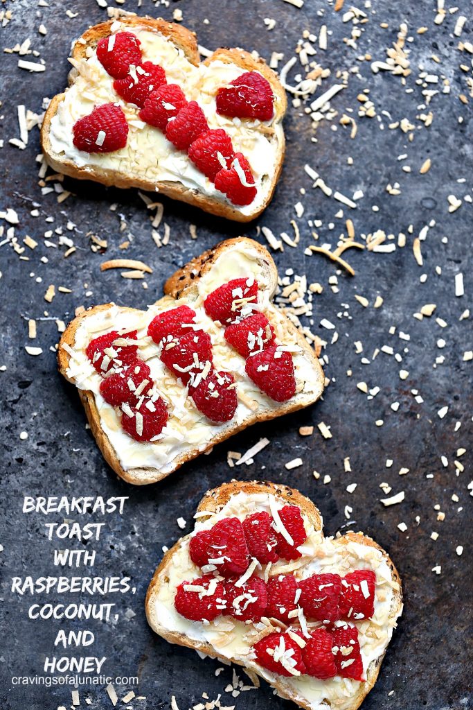 Breakfast Toast with Raspberries, Coconut, and Honey. For more amazing recipes please visit cravingsofalunatic.com