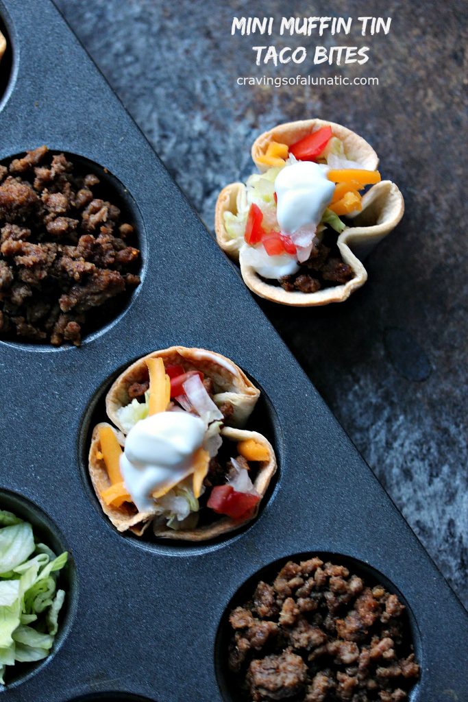 Mini Muffin Tin Taco Bites from cravingsofalunatic.com- Bite size taco cups made in mini muffin tins. These Mini Muffin Tin Taco Bites are perfect for the kids for lunch, dinner, or snacking. They also make great appetizers for parties.