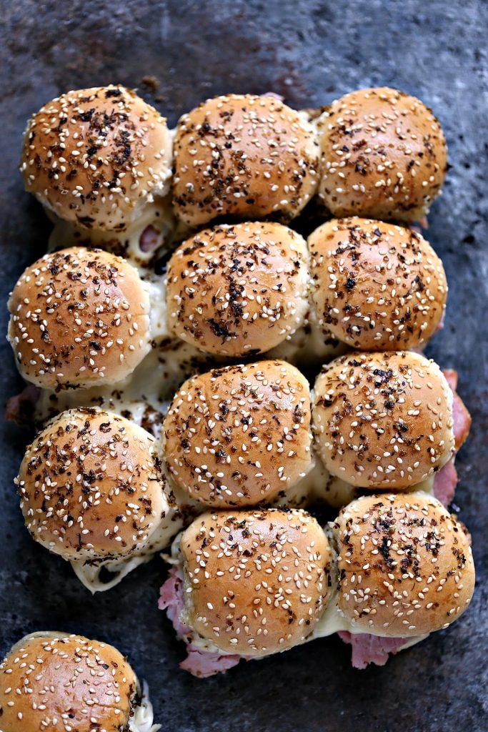 These Ham and Cheese Sliders put a fun twist on an old classic. This easy recipe is on the table in under 30 minutes. Make an extra batch because these will fly off the platter at rapid speed.