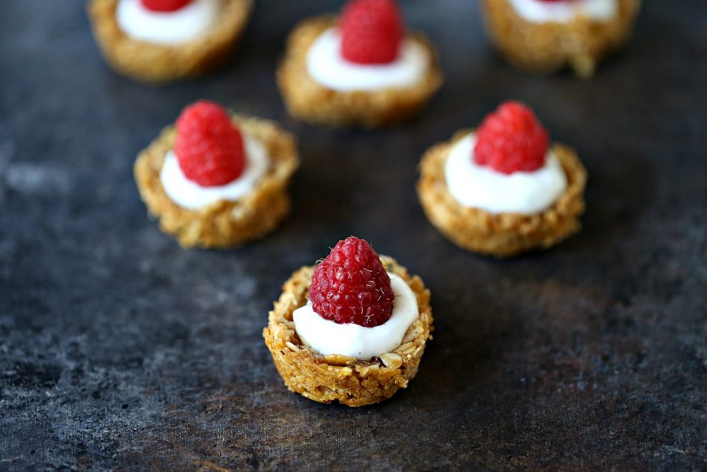 Easy Granola Cups with Berries from cravingsofalunatic.com- This easy recipe for Granola Cups is perfect for people who want a tasty breakfast without much fuss. Top with fresh berries for added deliciousness.