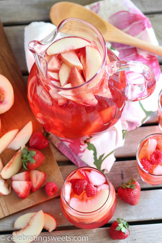 Peach Rosé Sangria from Julie's Eats and Treats- featured on The Best Sangria Recipes by cravingsofalunatic.com- Celebrate summer in epic style with The Best Sangria Recipes! Sangria is so easy to make and super versatile. Whip up a batch today!