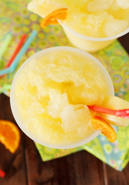 Rum Slush from The Kitchen is My Playground featured on The Best Slushie Recipes on cravingsofalunatic.com- Make your summer extra special by making all of The Best Slushie Recipes you possibly can. Nothing screams summer like shaved ice with fruity flavours!