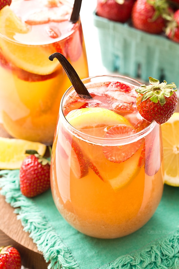 Strawberry Vanilla Sangria from Chocolate Moosey- featured on The Best Sangria Recipes by cravingsofalunatic.com- Celebrate summer in epic style with The Best Sangria Recipes! Sangria is so easy to make and super versatile. Whip up a batch today!