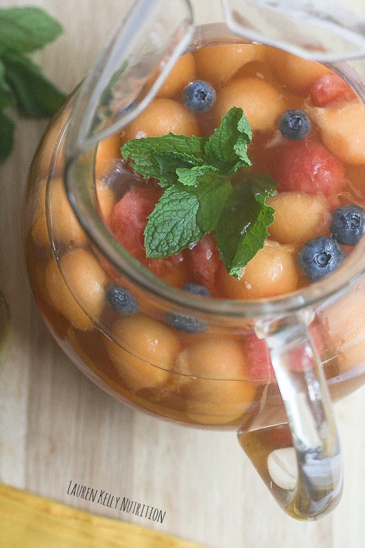 Healthy Mint Sangria from Lauren Kelly Nutrition- featured on The Best Sangria Recipes by cravingsofalunatic.com- Celebrate summer in epic style with The Best Sangria Recipes! Sangria is so easy to make and super versatile. Whip up a batch today!