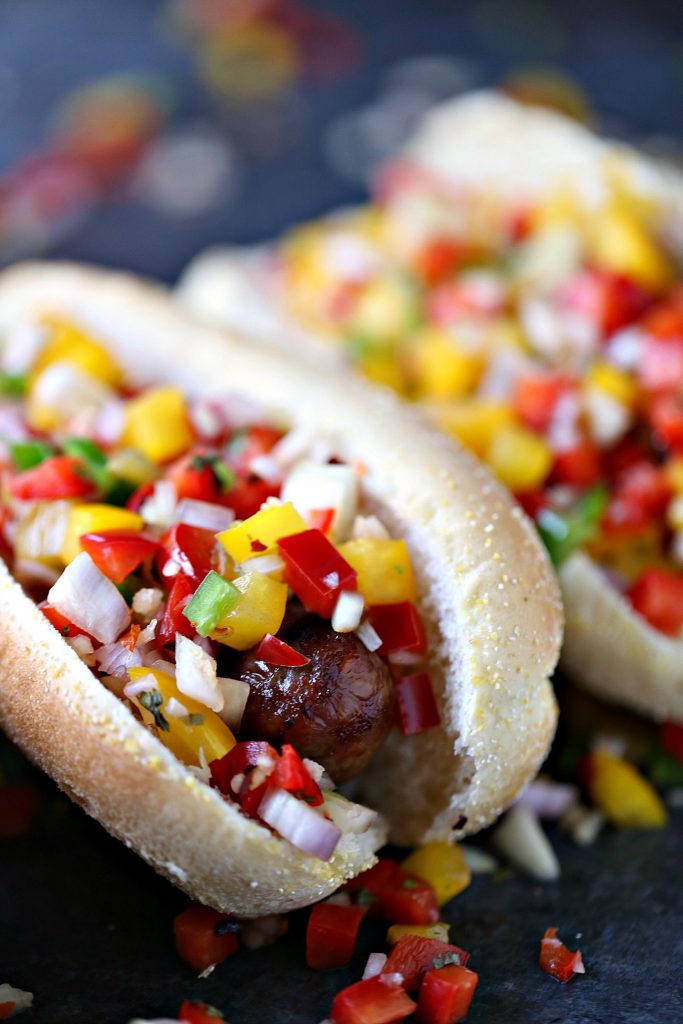 Grilled Beer Brats with Boozy Salsa from cravingsofalunatic.com- Fire up your grill this weekend and make these amazing grilled beer brats. Top with boozy salsa filled with bell peppers, onions, shallots, jalapeno peppers and garlic.