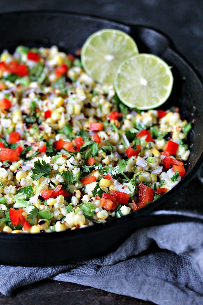 Mexican Street Corn Salad aka Esquites from cravingsofalunatic.com- This Mexican Street Corn Salad is the perfect mix of sweet, salty, and spicy. It’s all combined to make an amazing Esquites recipe that will satisfy your corn cravings.