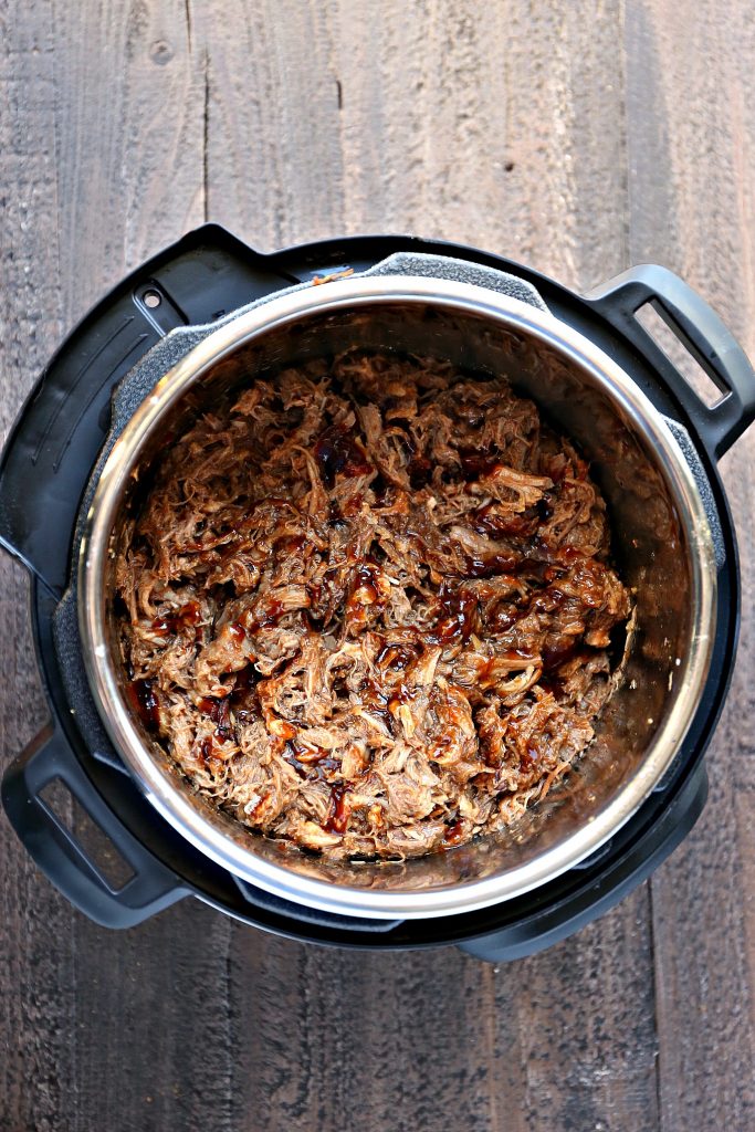 Instant Pot Pulled Pork overhead image of the recipe in the pot with the lid off. 