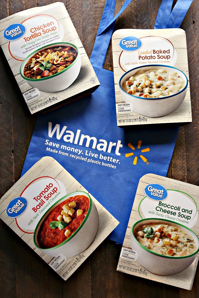 4 packages of soup and a blue walmart bag lying on a wood table