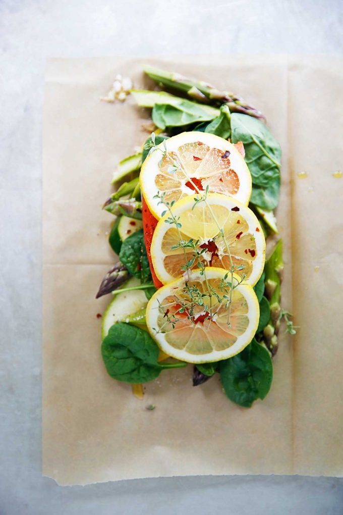 overhead image of Salmon and Veggies En Papillote from Lexi's Clean Kitchen 