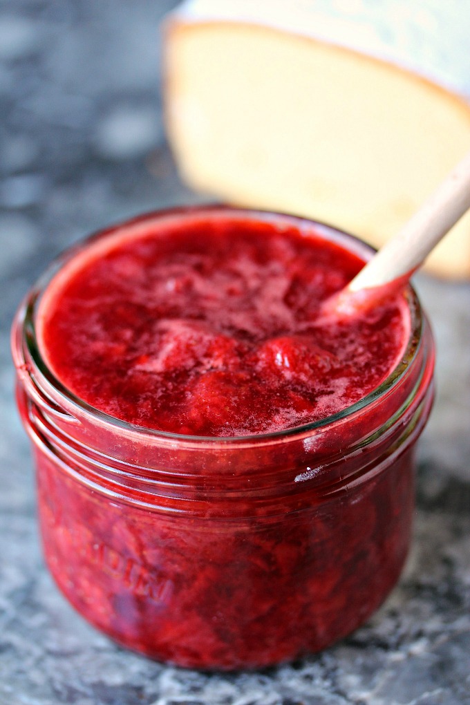close up image of strawberry compote in a mason jar 