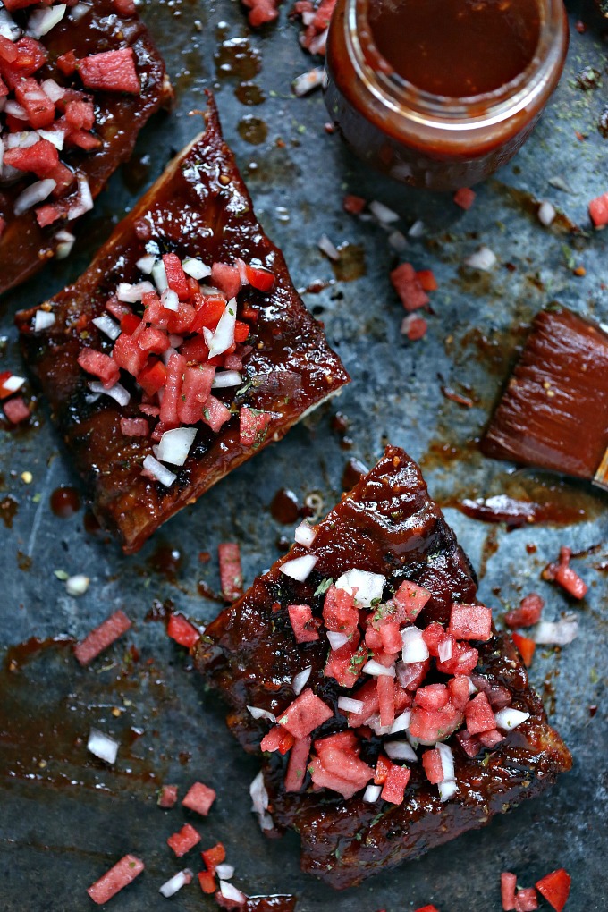 Grilled Ribs brushed with Watermelon BBQ Sauce and topped with Watermelon Salsa. 