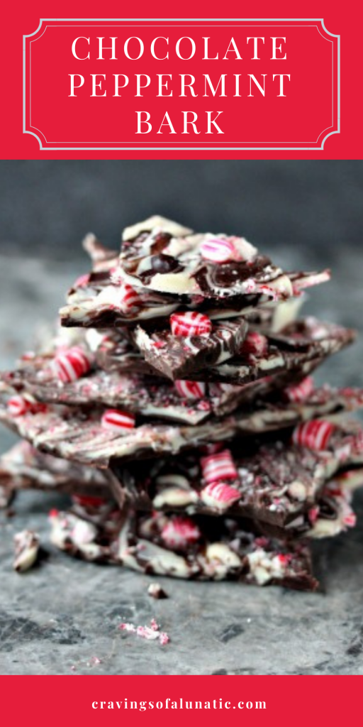 Chocolate Peppermint Bark stacked on a grey surface. 