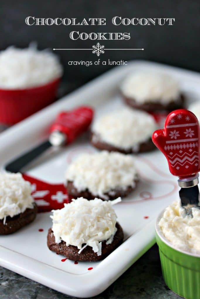 Chocolate coconut cookies on a white festive holiday platter.