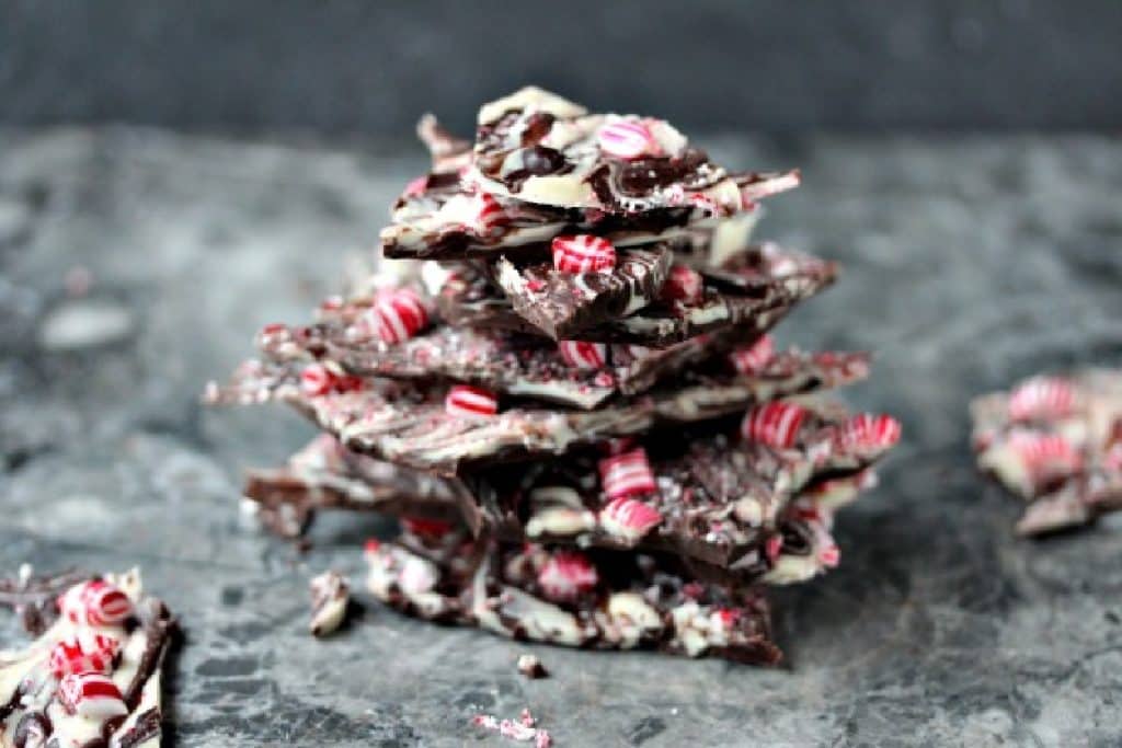 Chocolate peppermint bark stacked on a counter